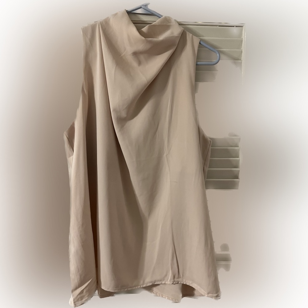 Beige sleeveless blouse